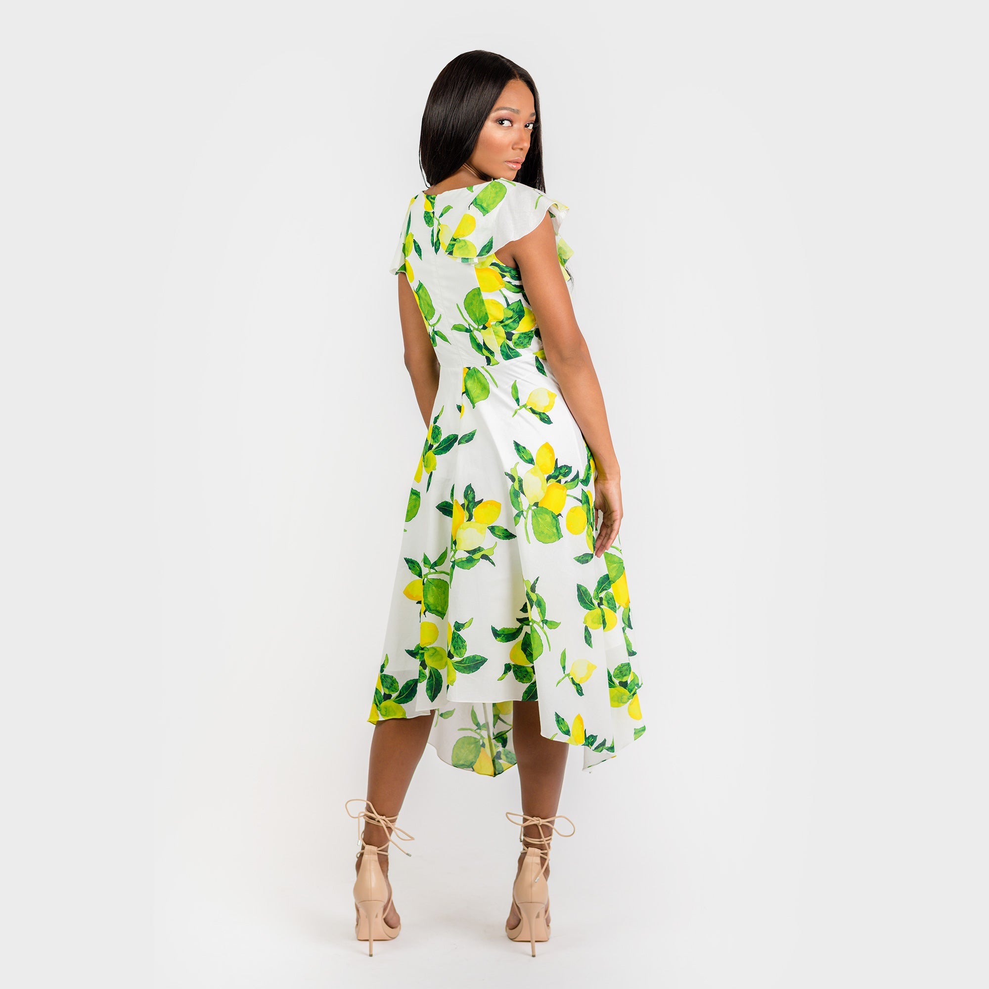 CN7177 Ruffled Nkline Sharkbite Hem Dress